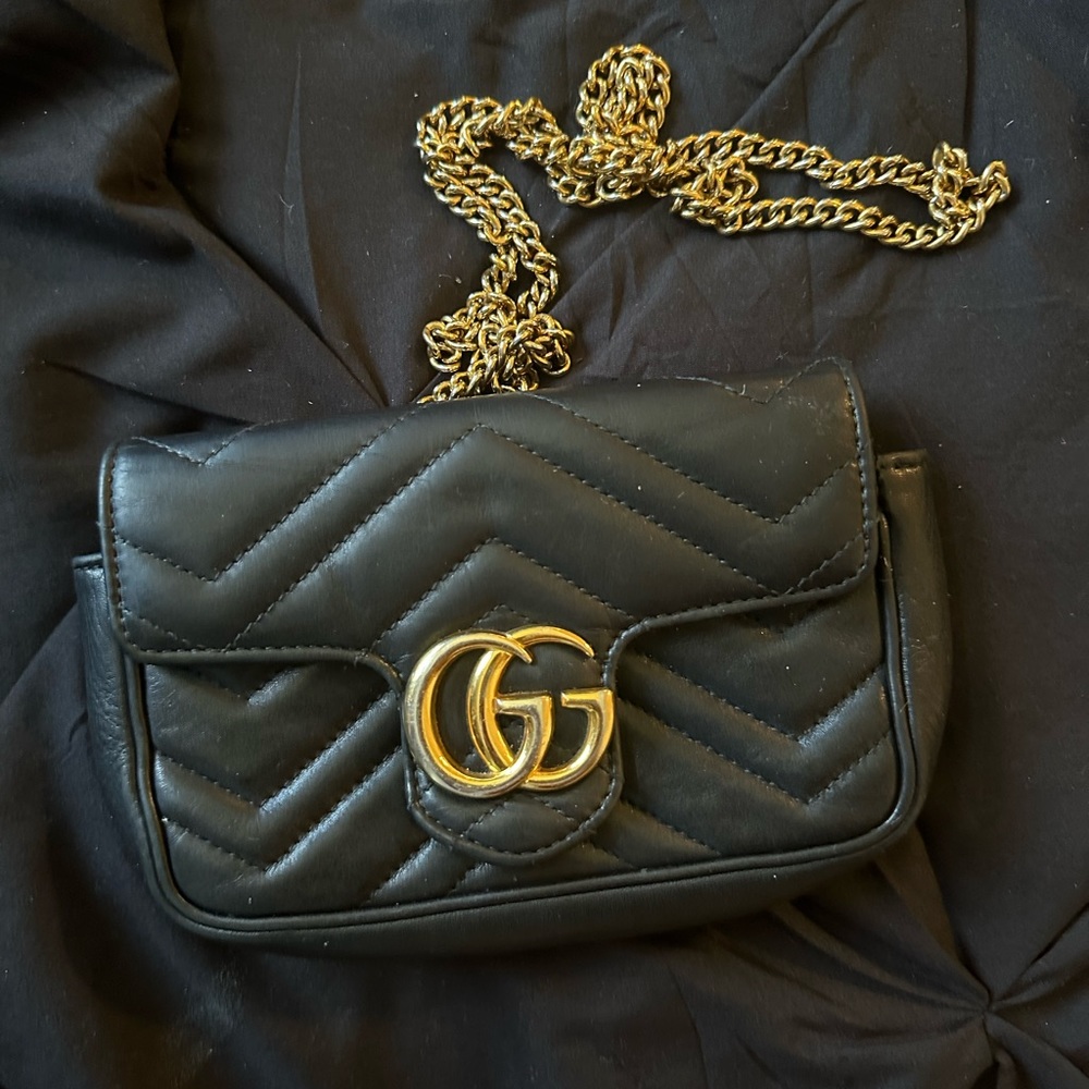 Authentic Gucci Marmont bag. Heavy gold chain adjustable strap.